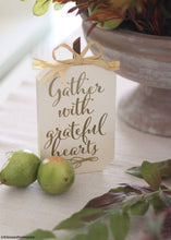 Load image into Gallery viewer, Bag of 9 Green Waterproof Pear Fruit Picks - 1.5&quot; Wide
